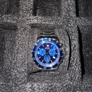 Movado Blue and Silver Watch